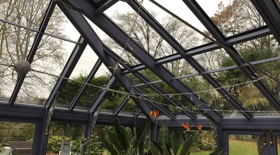 Clean glass in Thame conservatory