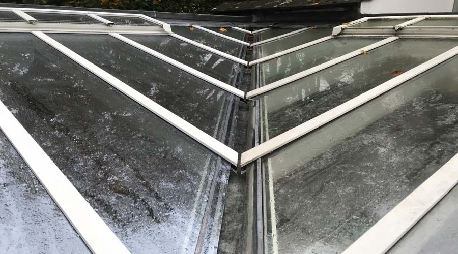 Dirty conservatory roof window cleaning